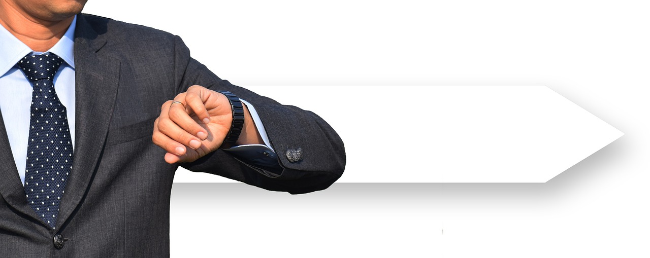 businessman, men's suit, clock-4279254.jpg